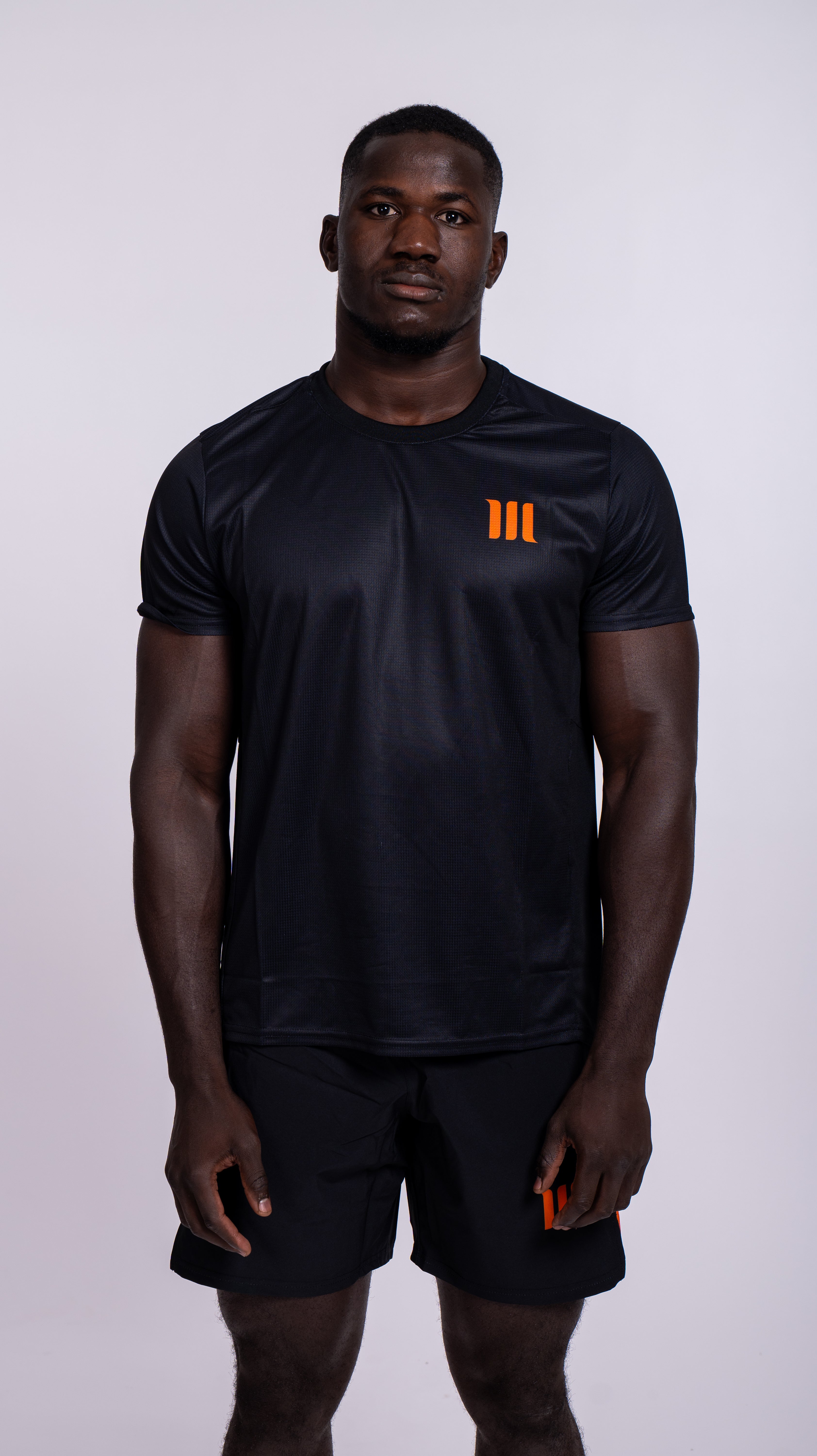 SHORT ORANGE NEW BLACK