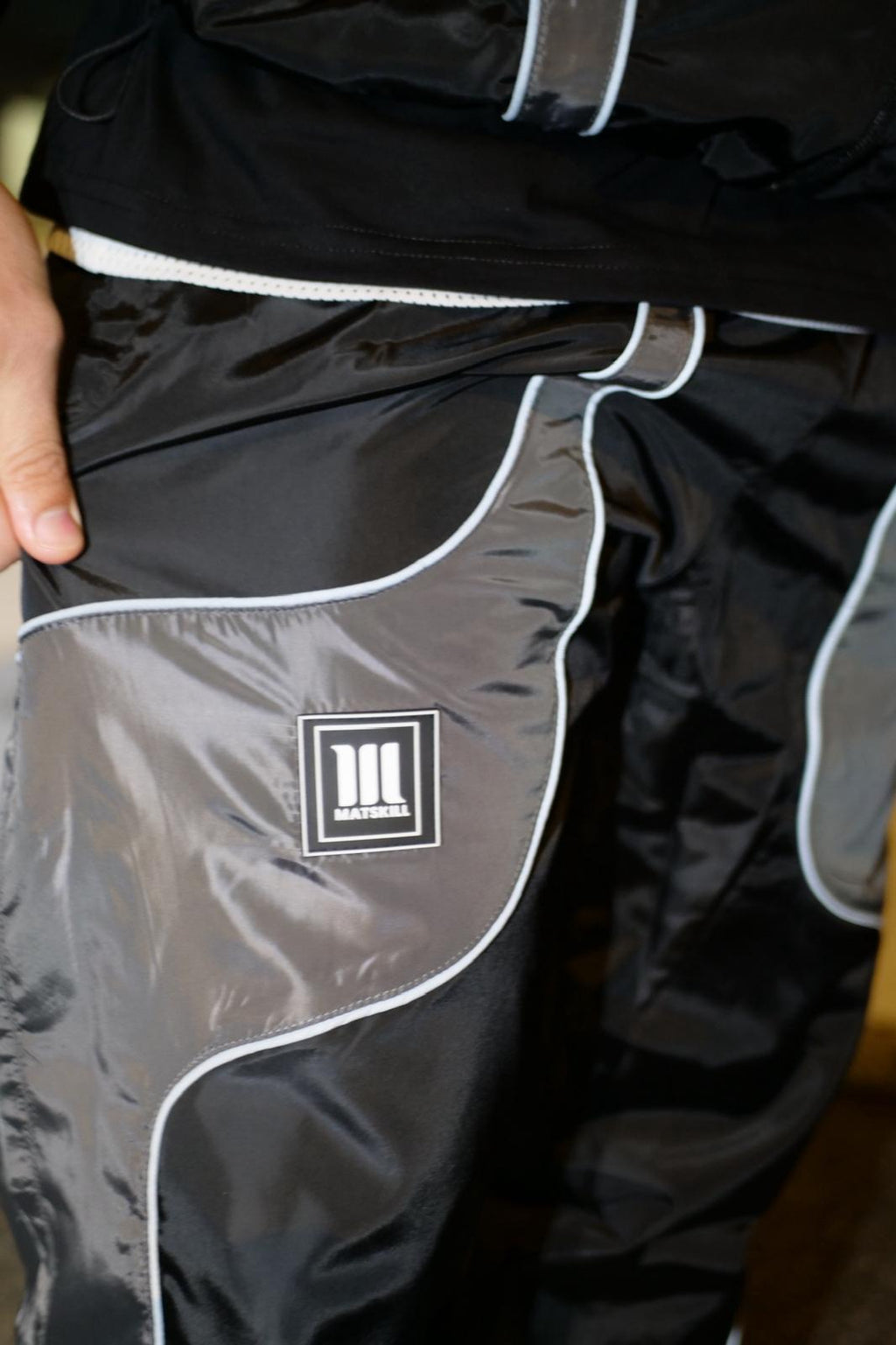 REFLECTIVE PERFORMANCE DIVISION Track Suit - Black Edition